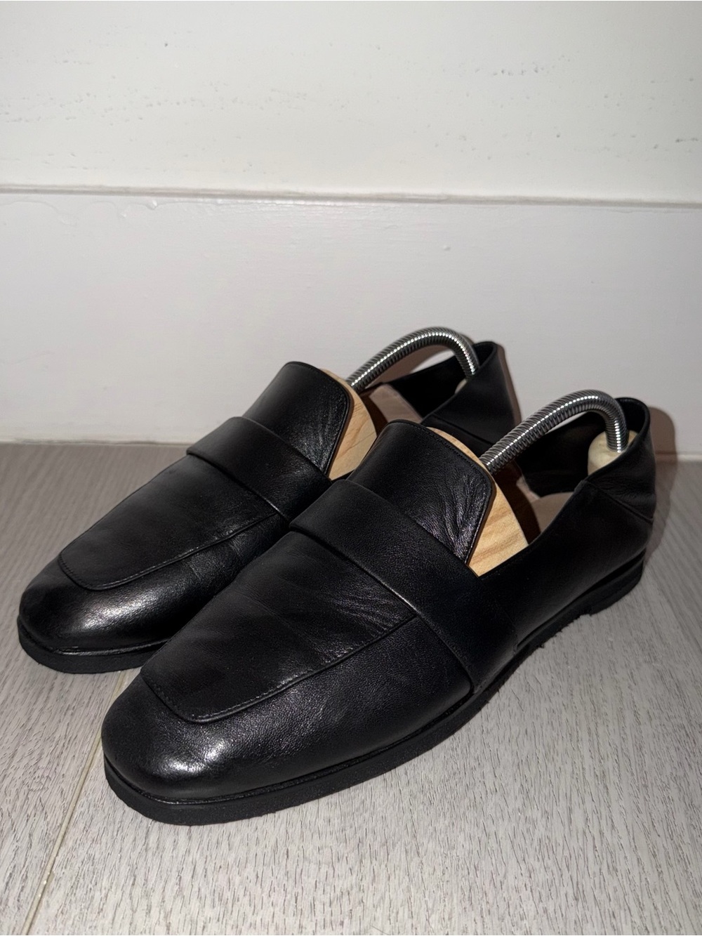 Stuart Weitzman Black Leather Slip-On Loafers